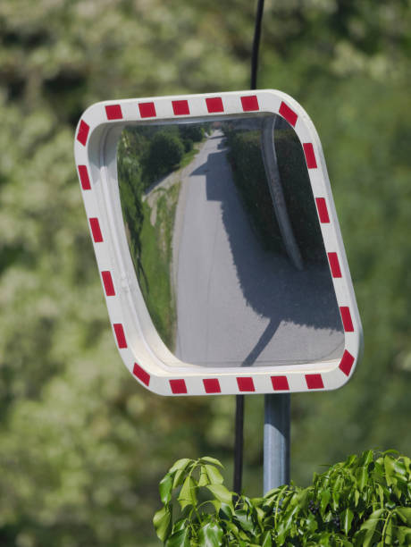 istock Vertical selective focus shot of a Safety Road Mirror sign 1397315418