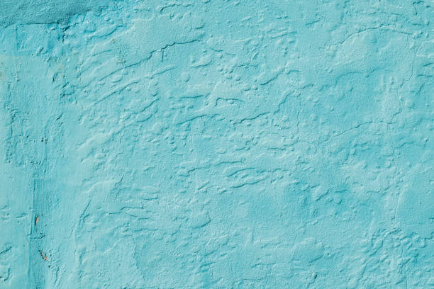 Part of a painted concrete wall.