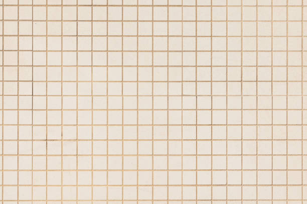 Old cream colored wall tiles