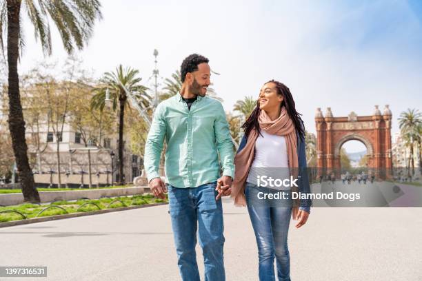 Happy Hispanic Latino Couple Dating Outdoors Stock Photo - Download Image Now - 20-29 Years, Adult, African Ethnicity