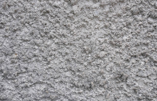 istock Dirty concrete and white old cement wall.Grungy rough surface wall. 1397319958