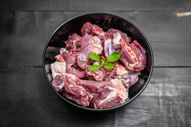 istock Chopped raw meat on black background , top view . raw Lamb and mutton meat isolated. 1397328183