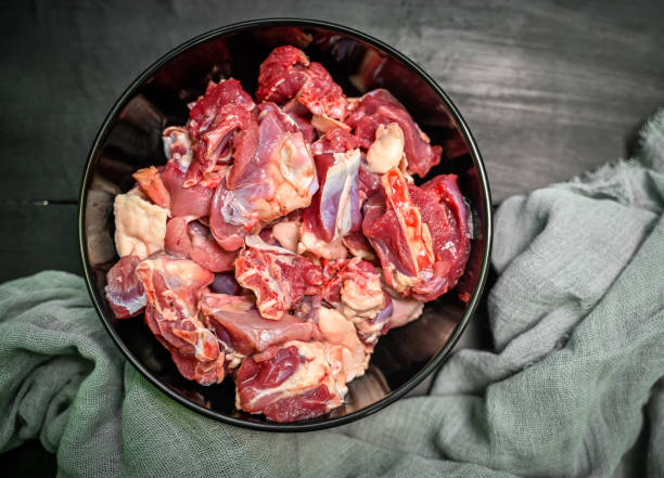 istock Chopped raw meat on black background , top view . raw Lamb and mutton meat isolated. 1397328285