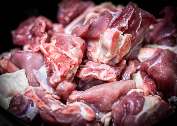 istock Chopped raw meat on black background , top view . raw Lamb and mutton meat isolated. 1397328426