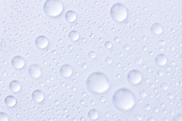 istock Water drops on white background. Abstract drops of gel. 1397330962