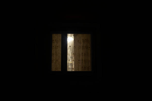 istock Window is in dark. Curtains on window at night. 1397331838