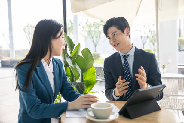 istock Business partners having a meeting in a cafe 1397331894