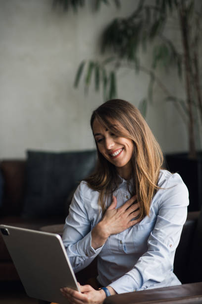 istock Young businesswoman on a video call, smiling 1397333009