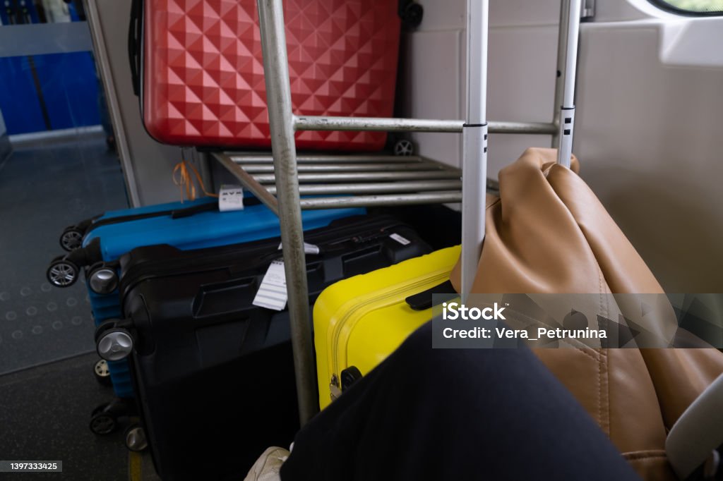 bags and valises int rain bags and valises int rain travel concept Suitcase Stock Photo