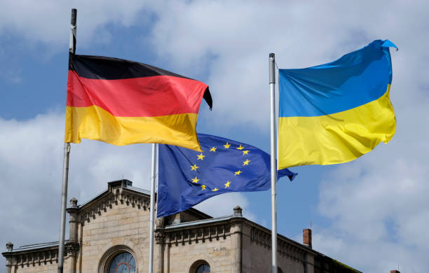 istock The flags of Ukraine, Germany, and the EU 1397335362