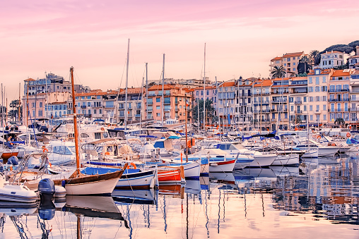 Old harbor in Cannes at sunset