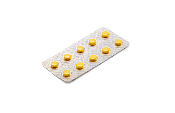 Close up on tablets and cough pill in blister packaging arranged on white background, Pharmaceutical industry medical and healthcare concept. Pharmacy drugstore, clipping path.