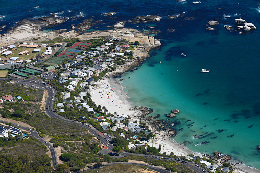 Aerial view of Clifton Beach and Camps Bay as tourists enjoy the sights in the city of Cape Town, South Africa. More than two years after the pandemic and strict lockdown which saw travel bans placed on South Africa, international travel has seen a recovery of 76% in Cape Town and domestic by 75% with 27 000 passengers pass through airports last weekend .