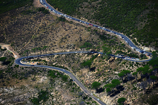 A view of hiking paths and roads leading up to the famous Lions Head as tourists are seen walking up Table Mountain in Cape Town, South Africa. More than two years after the pandemic and strict lockdown which saw travel bans placed on South Africa, international travel has seen a recovery of 76% in Cape Town and domestic by 75% with 27 000 passengers pass through airports last weekend .