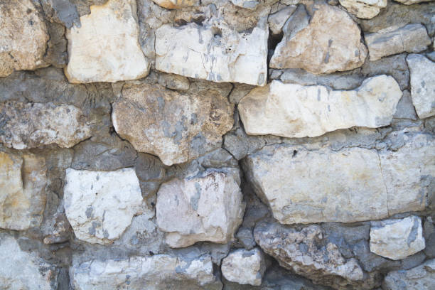istock Old wall with a crack.Grunge background in dark color. 1397338629