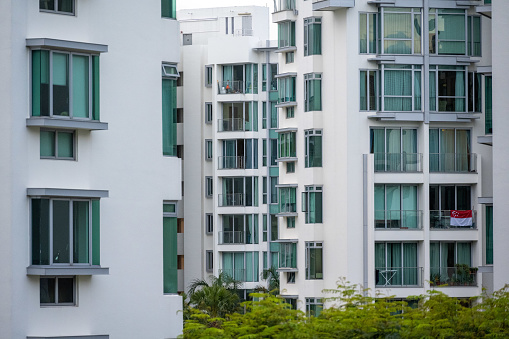 The exterior of some luxury residential houses in the south of Singapore, seen a warm summer day.