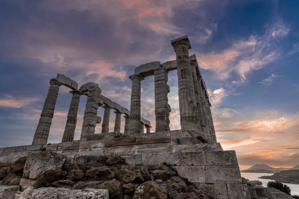 Sunset at the foot of the temple Evening at Cape Sounion at the foot of the ancient temple of Poseidon. ancient greece stock pictures, royalty-free photos & images
