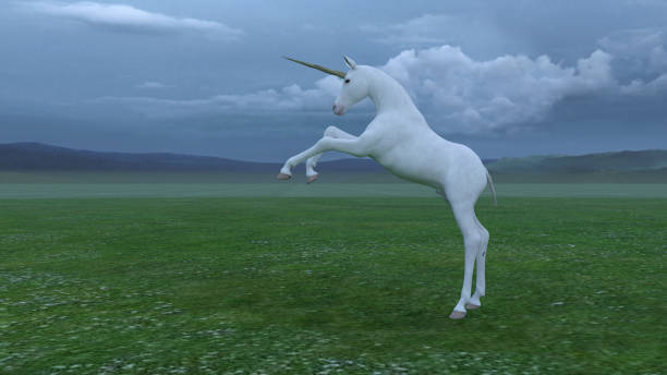 istock Unicorns in a green field 1397342719