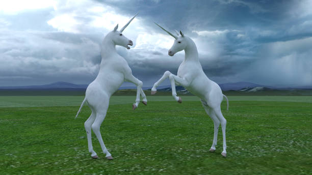 istock Unicorns in a green field 1397342722