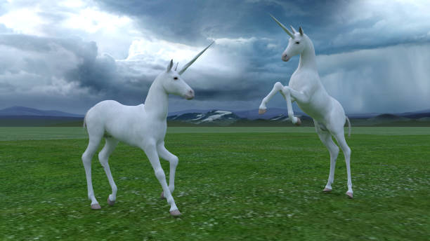 istock Unicorns in a green field 1397342723