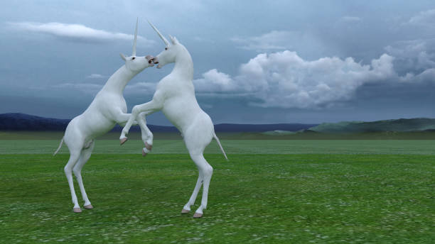 istock Unicorns in a green field 1397342727