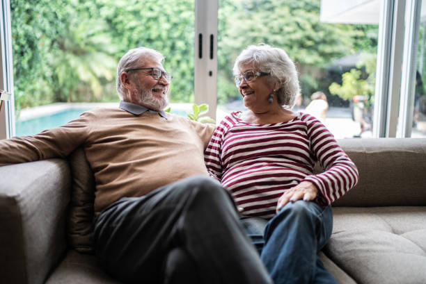 istock Happy senior couple talking at home 1397342832
