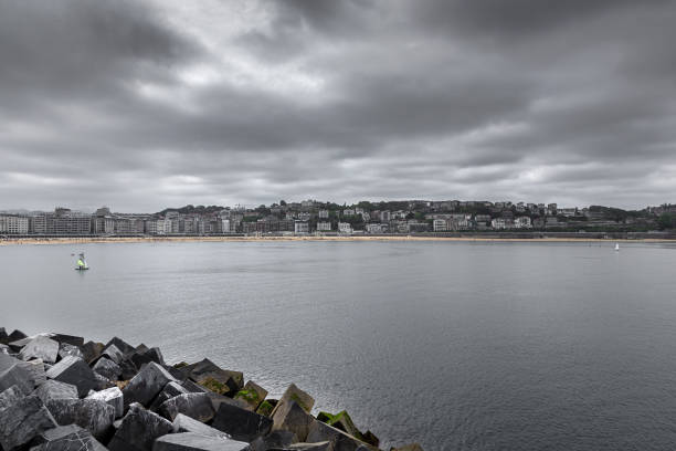 La Concha beach in San Sebastian, Basque Country with a cloudy day. Cantabrian Sea
