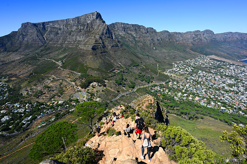 A view of Table Mountain is seen as tourists enjoy the sights in the city of Cape Town, South Africa. More than two years after the pandemic and strict lockdown which saw travel bans placed on South Africa, international travel has seen a recovery of 76% in Cape Town and domestic by 75% with 27 000 passengers pass through airports last weekend .