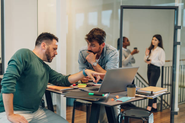istock Two business colleagues working together in the office 1397347545