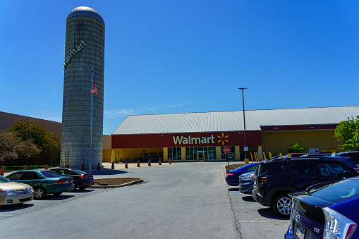 Exton, PA, USA - May 10, 2022: The Walmart at the Main Street at Exton center is styled like a barn, keeping with the rural farmland that used to build the shopping center.