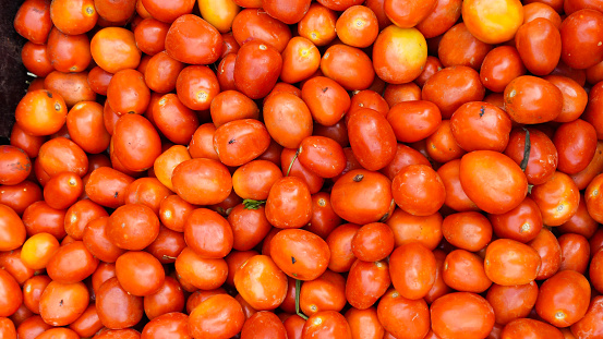 Fresh tomatoes on sale at the market stock phot