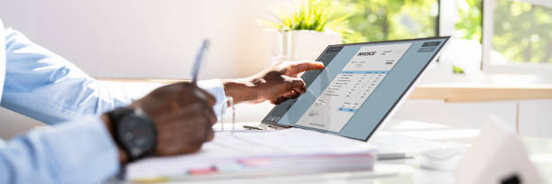 istock Accountant calculating tax at desk 1397357195