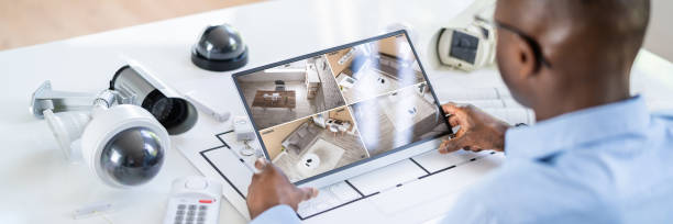 istock Person Watching Footage On Tablet With Security Equipment 1397357245