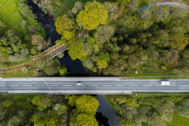 istock Traffic on a modern road bridge crossing a river 1397358458
