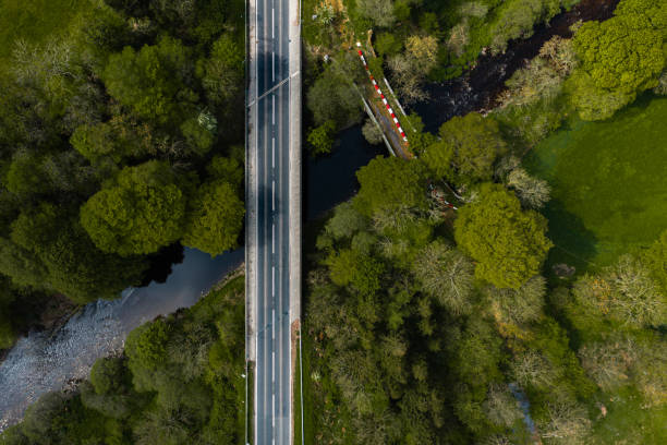 istock Modern and old bridges crossing a small river 1397359061