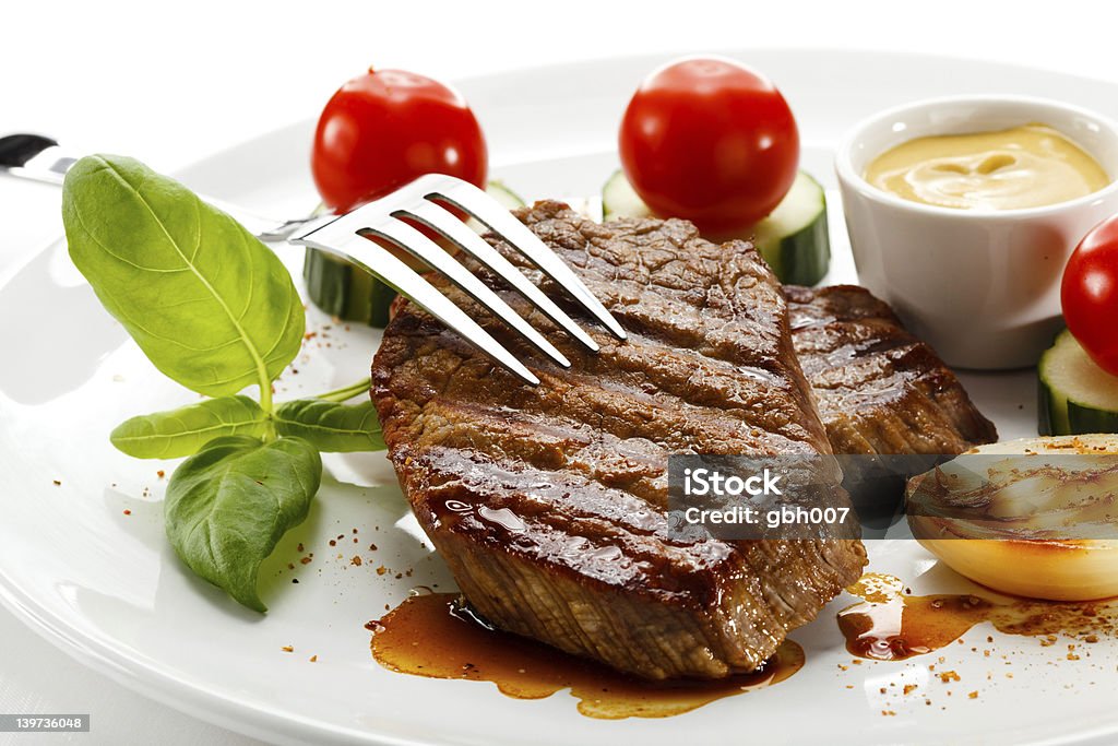 Grilled meat and vegetables Grilled beefsteaks   Basil Stock Photo