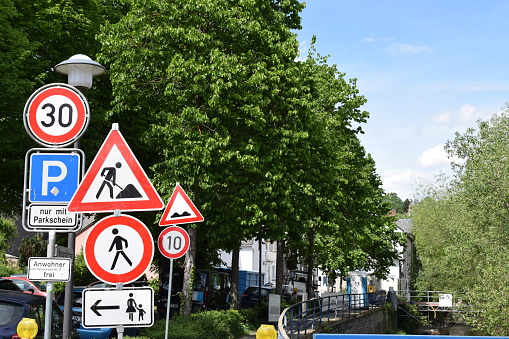 Mayen, Germany - 05/12/2022: too many traffic signs at the roadworks