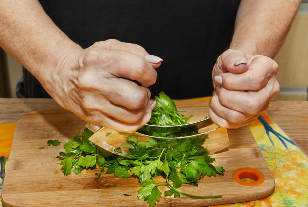 istock Chef grinds dill with special device that speeds up the work 1397360959