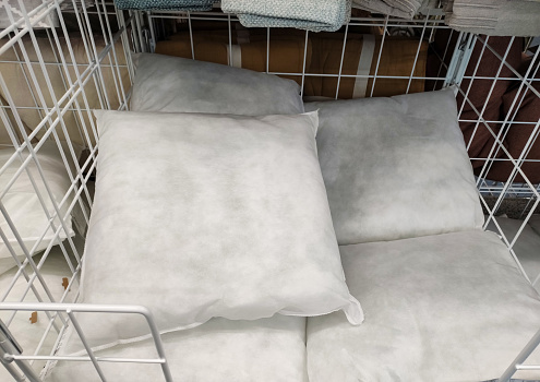 Pillows with artificial filling, goods in the store.