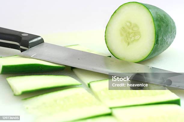 Cutting Cucumber Stock Photo - Download Image Now - Cold Temperature, Cool Attitude, Cucumber