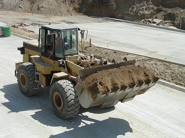 Cargador de transporte cuchara de la suciedad - foto de stock