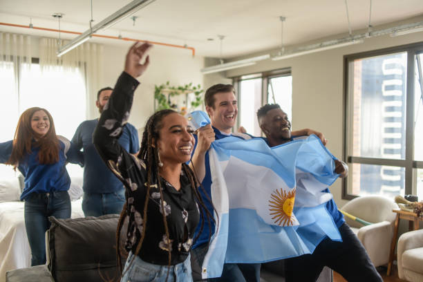 istock Argentinian fans celebrating the goal 1397365175