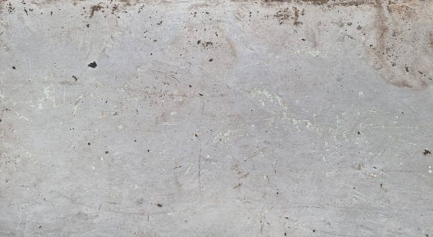 istock grunge vintage rough detailed texture concrete wall with rusty stained use as background. architectural loft concrete wall texture background. gray flat concrete surface. 1397365467