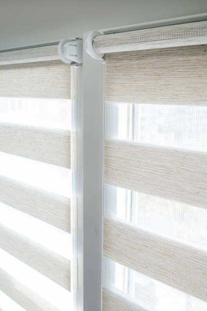 istock Window roller duo system day and night. Close up on roll curtains indoor. 1397366306