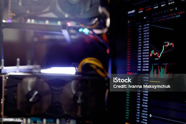 Graphics Cards In Rig For Ethereum Mining Farm On Background Stock Market Eth Chart Stock Photo - Download Image Now
