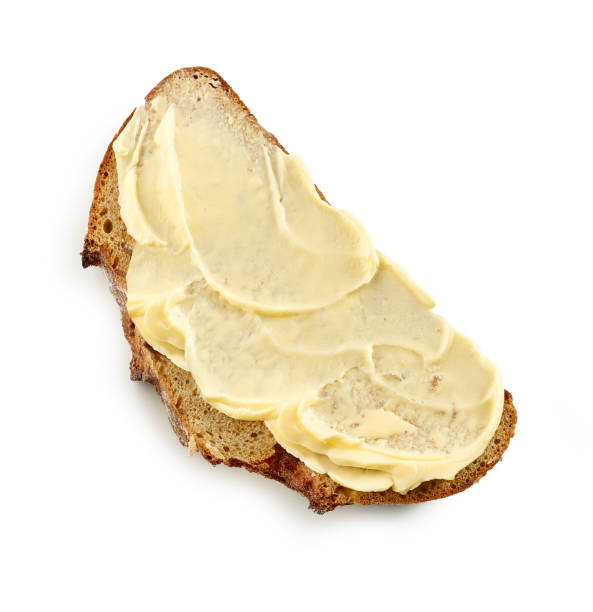 kromka chleba z masłem - butter margarine fat bread zdjęcia i obrazy z banku zdjęć