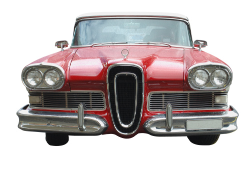A large car from the 50s, isolated on a white background. (Clipping path included).