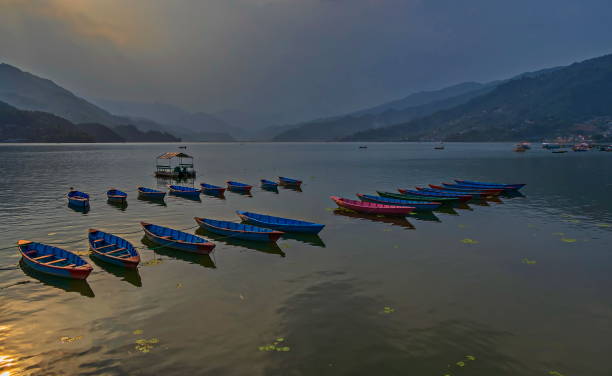 istock Cloudy sunset at Phewa lake, Pokhara, Nepal 1397368953