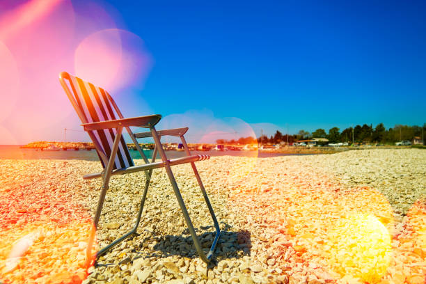 red yellow sun lounger on a beach on poniente Beach in town of benidorm in spain