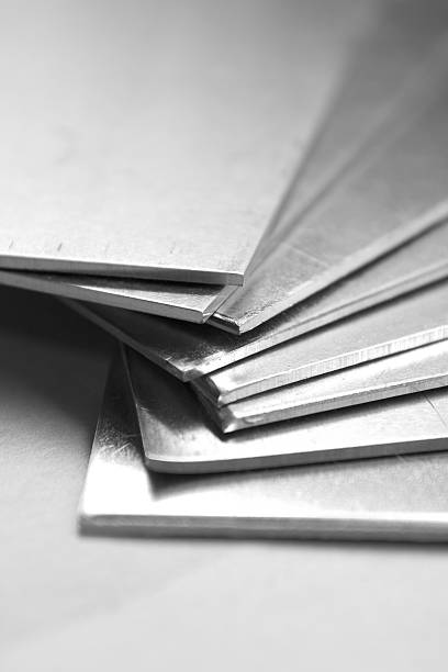 istock Eight aluminum plates on table in a fanned stack 139736973